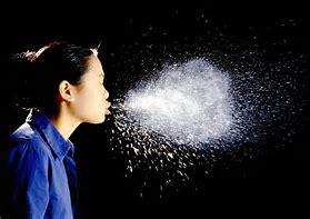 wuhan woman sneezing aerosol transmission of covid-19 coronavirus